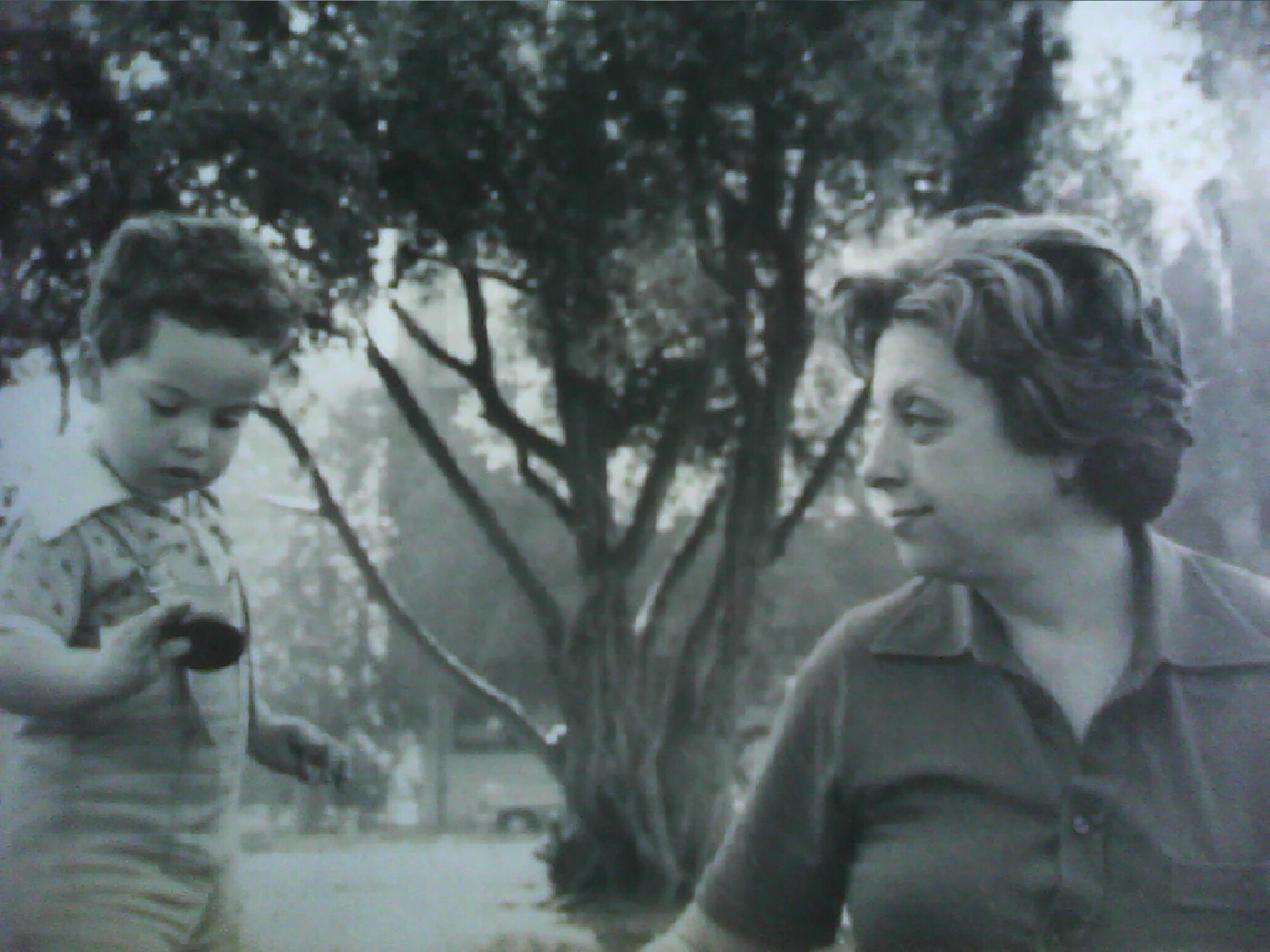Marisa Bay with her grandson Louis Hannibal Nez outdoors